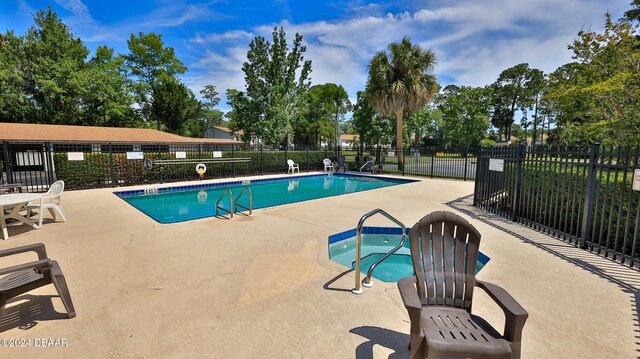 view of pool with a patio