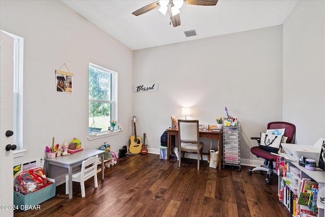 office area with dark wood-type flooring and ceiling fan