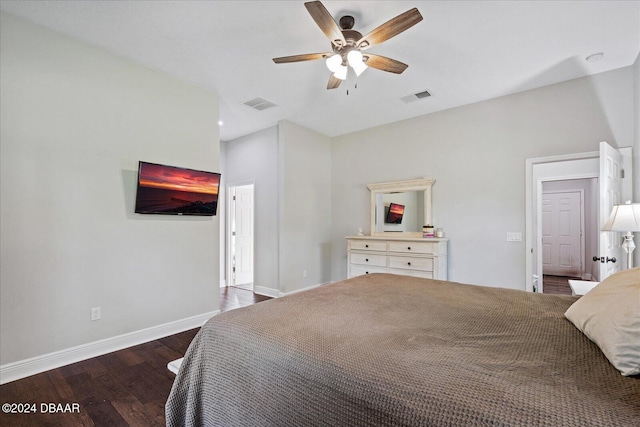 bedroom with ceiling fan and dark hardwood / wood-style flooring