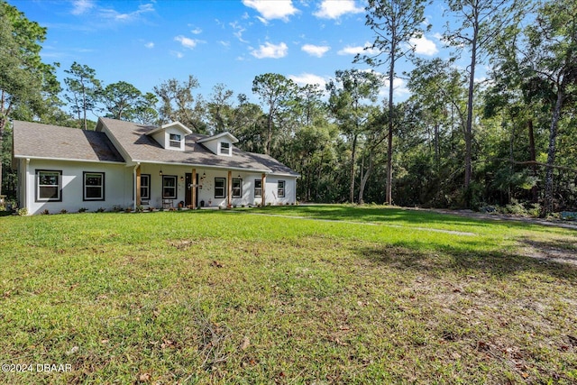 view of front of home with a front lawn