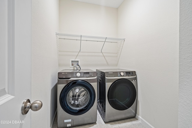 laundry room featuring separate washer and dryer