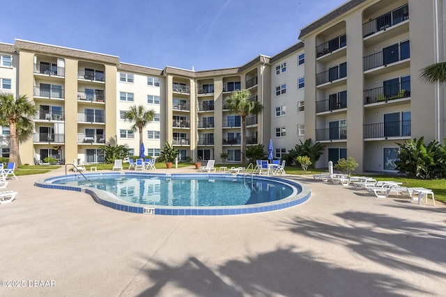 pool with a patio
