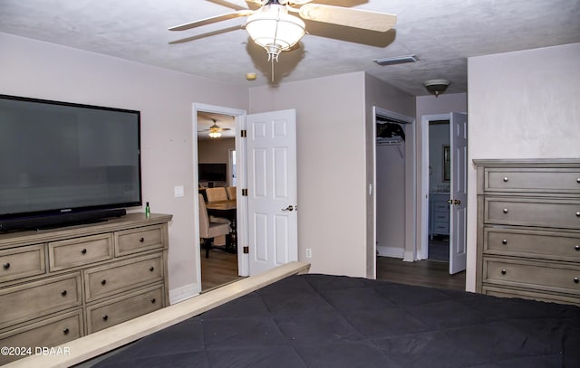 unfurnished bedroom featuring a textured ceiling, a closet, and ceiling fan