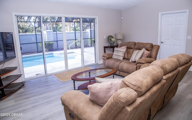 living room with light hardwood / wood-style flooring