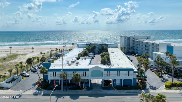 aerial view with a view of the beach and a water view