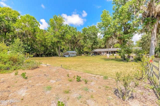 view of yard featuring fence