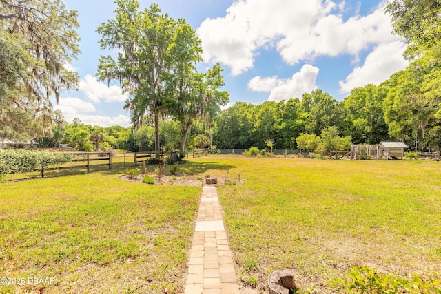 view of yard with fence