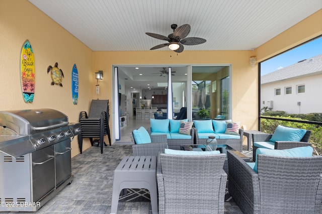 view of patio featuring outdoor lounge area, a ceiling fan, and grilling area