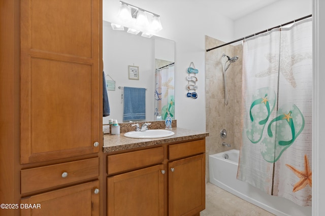 bathroom with tile patterned flooring, shower / bath combo with shower curtain, and vanity