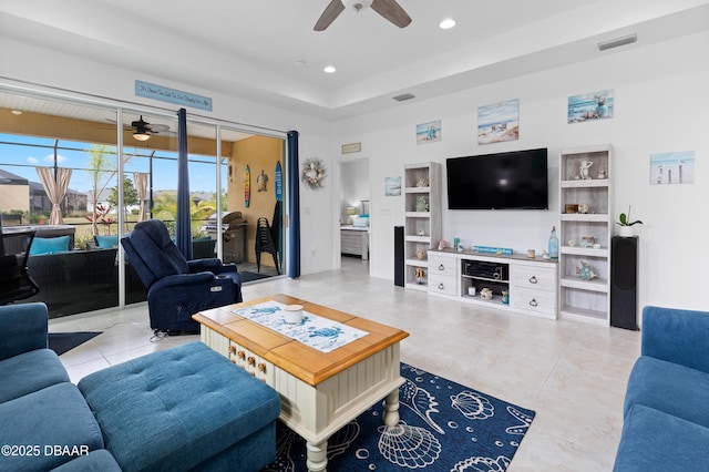 living area featuring tile patterned floors, recessed lighting, visible vents, and ceiling fan