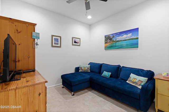 living area featuring light tile patterned floors, recessed lighting, baseboards, and ceiling fan