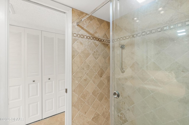 2987 S Atlantic Ave Unit 903, Daytona Beach Shores, FL 32118 - bathroom with a closet and a stall shower