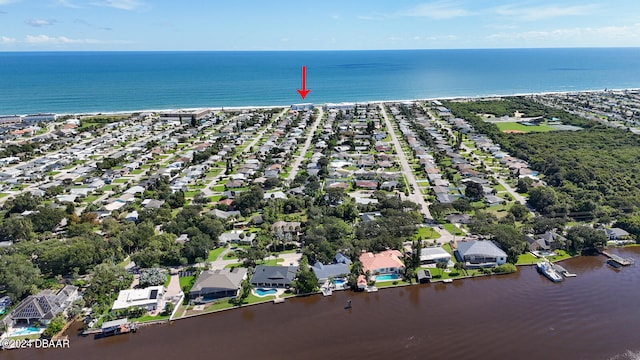 bird's eye view with a water view