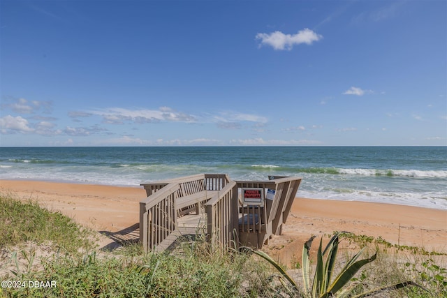 property view of water featuring a beach view