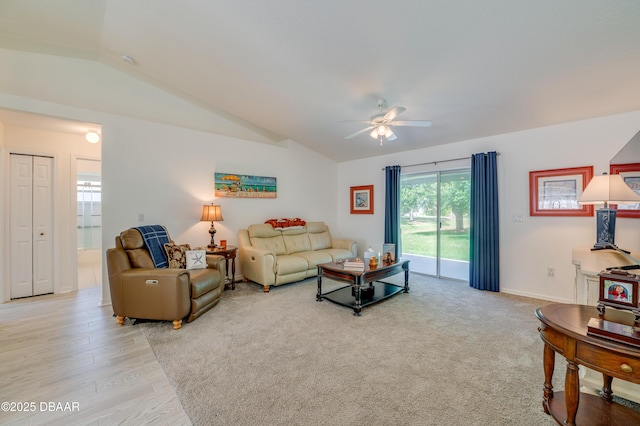 49 Felshire Ln, Palm Coast, FL 32137 - living room with vaulted ceiling, ceiling fan, and light wood finished floors