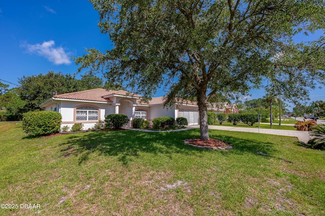 49 Felshire Ln, Palm Coast, FL 32137 - view of front of home featuring a garage, stucco siding, a front lawn, driveway, and a tile roof