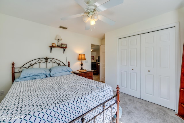 49 Felshire Ln, Palm Coast, FL 32137 - bedroom with a closet, light colored carpet, and ceiling fan