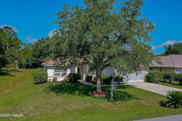 49 Felshire Ln, Palm Coast, FL 32137 - obstructed view of property with driveway, a front lawn, and stucco siding