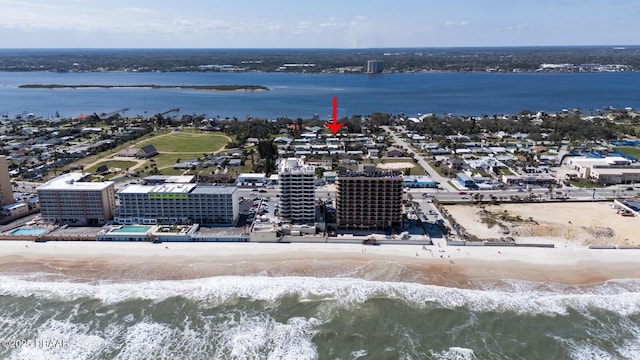 drone / aerial view with a water view and a city view