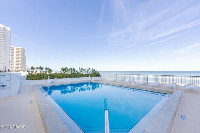 pool featuring a water view