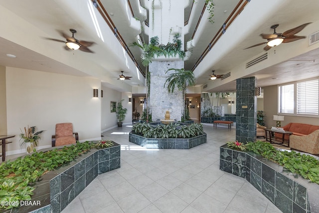 view of home's community featuring outdoor lounge area, a patio, a ceiling fan, and visible vents