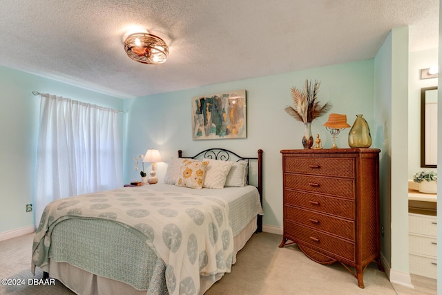 118 Lagoon Ct, New Smyrna Beach, FL 32169 - bedroom with light colored carpet, a textured ceiling, and baseboards
