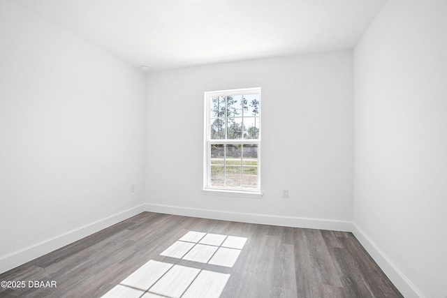 unfurnished room featuring hardwood / wood-style floors