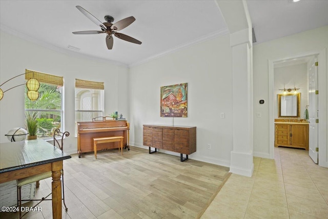 miscellaneous room featuring ceiling fan, ornamental molding, and light hardwood / wood-style flooring