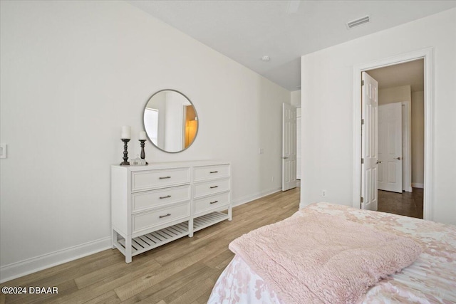 bedroom featuring light hardwood / wood-style floors