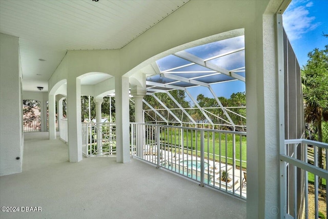 view of patio / terrace with glass enclosure