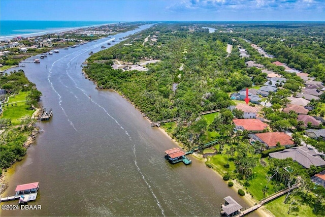 birds eye view of property featuring a water view