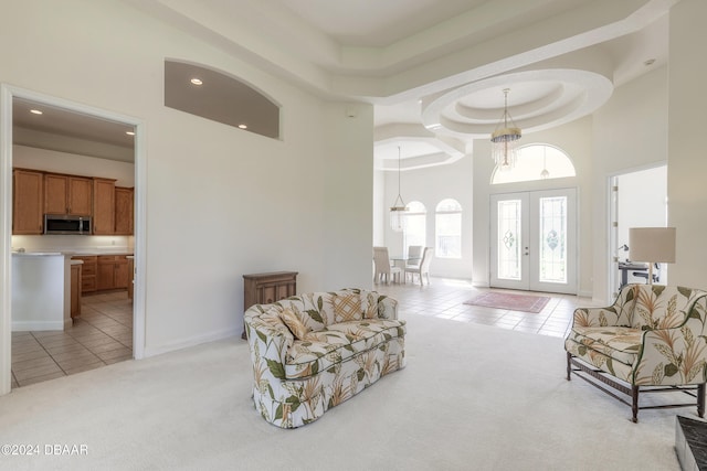 interior space with a high ceiling and french doors