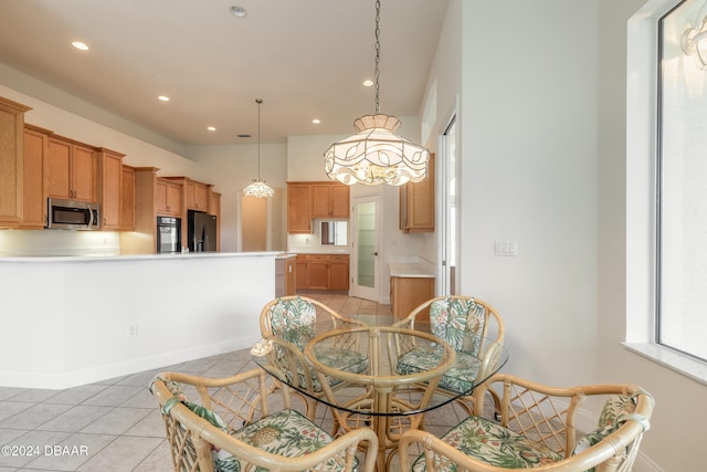 dining area with light tile patterned floors