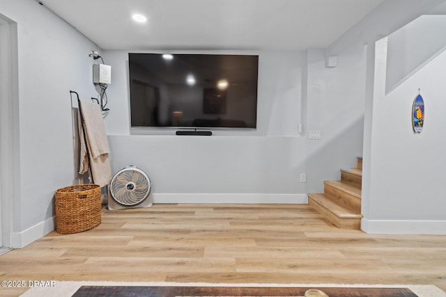 living room with light hardwood / wood-style floors