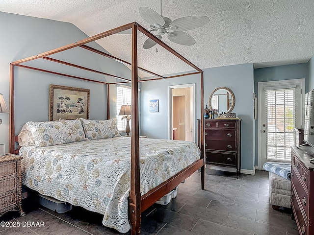 31 Sea Harbor Dr E Unit E, Ormond Beach, FL 32176 - bedroom with lofted ceiling, a textured ceiling, access to exterior, and ceiling fan
