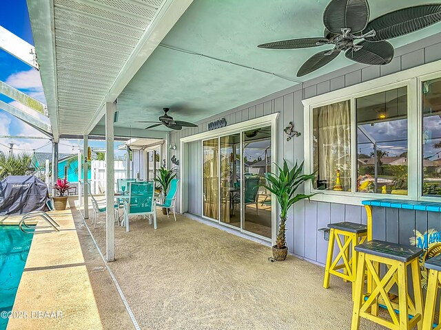 31 Sea Harbor Dr E Unit E, Ormond Beach, FL 32176 - view of patio / terrace featuring ceiling fan