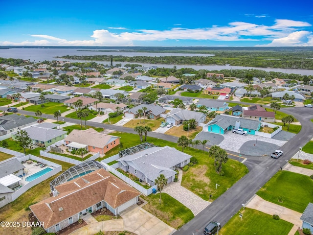 31 Sea Harbor Dr E Unit E, Ormond Beach, FL 32176 - aerial perspective of suburban area featuring a nearby body of water