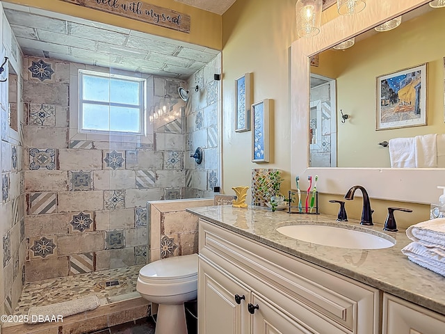 31 Sea Harbor Dr E Unit E, Ormond Beach, FL 32176 - bathroom featuring vanity and a tile shower