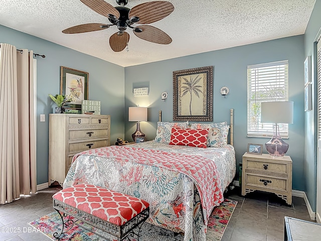 31 Sea Harbor Dr E Unit E, Ormond Beach, FL 32176 - bedroom featuring a textured ceiling and a ceiling fan