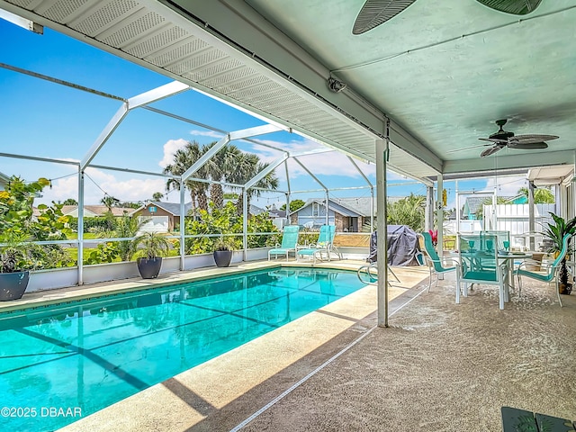 31 Sea Harbor Dr E Unit E, Ormond Beach, FL 32176 - swimming pool featuring a patio, a ceiling fan, and a lanai