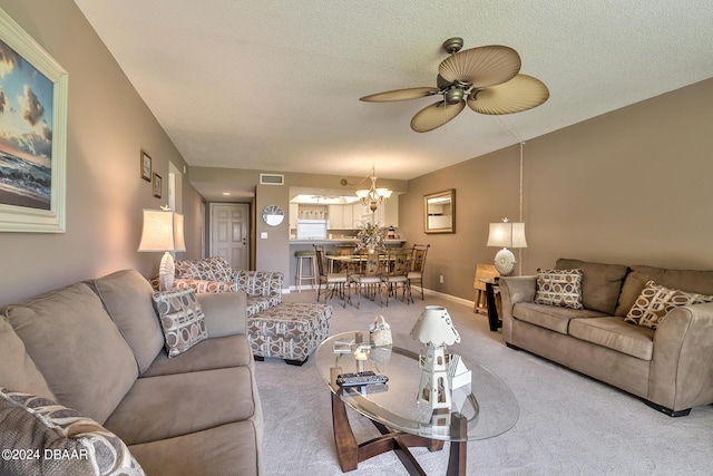 2100 Ocean Shore Blvd Unit 109, Ormond Beach, FL 32176 - living area with ceiling fan, light carpet, and a chandelier