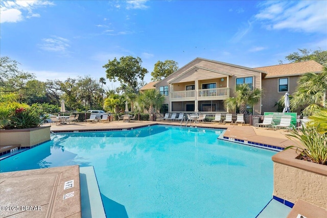 view of pool featuring a patio