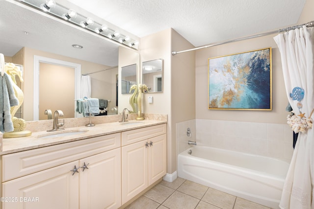 bathroom with shower / bathtub combination with curtain, tile patterned flooring, vanity, and a textured ceiling