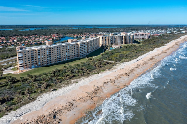 drone / aerial view with a view of the beach and a water view