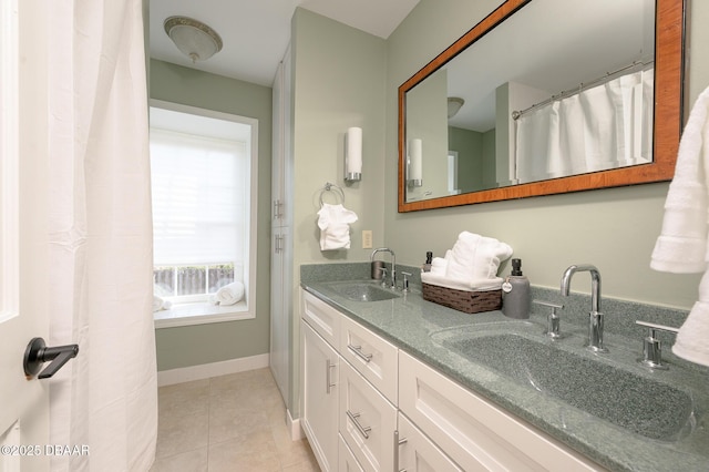 bathroom with vanity and tile patterned floors