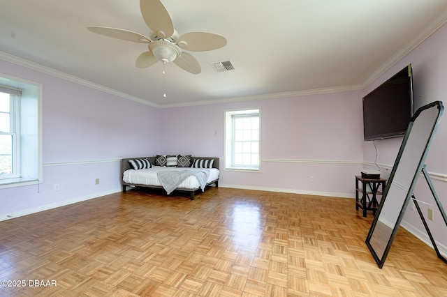 bedroom featuring ornamental molding, light parquet flooring, and ceiling fan