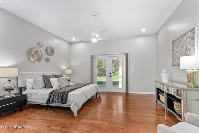 bedroom featuring hardwood / wood-style flooring, ceiling fan, access to exterior, and french doors