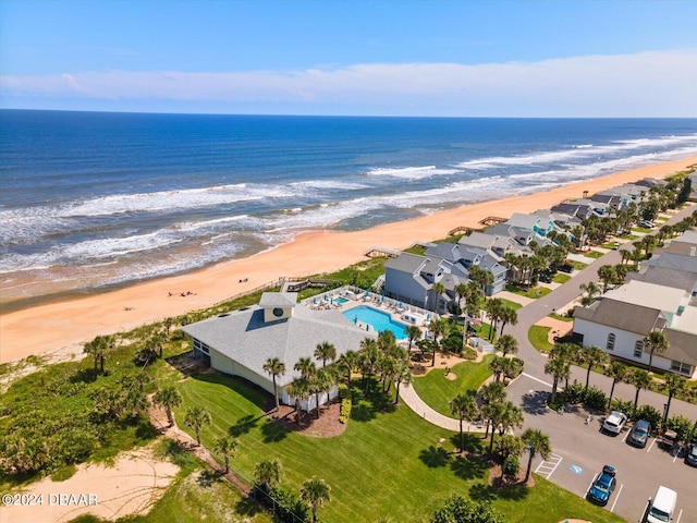 aerial view featuring a water view and a beach view