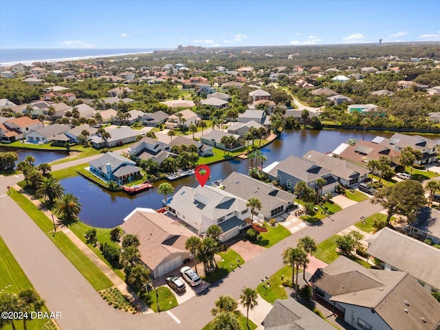 aerial view with a water view and a residential view