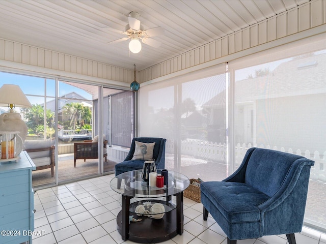 sunroom / solarium with wooden ceiling and ceiling fan